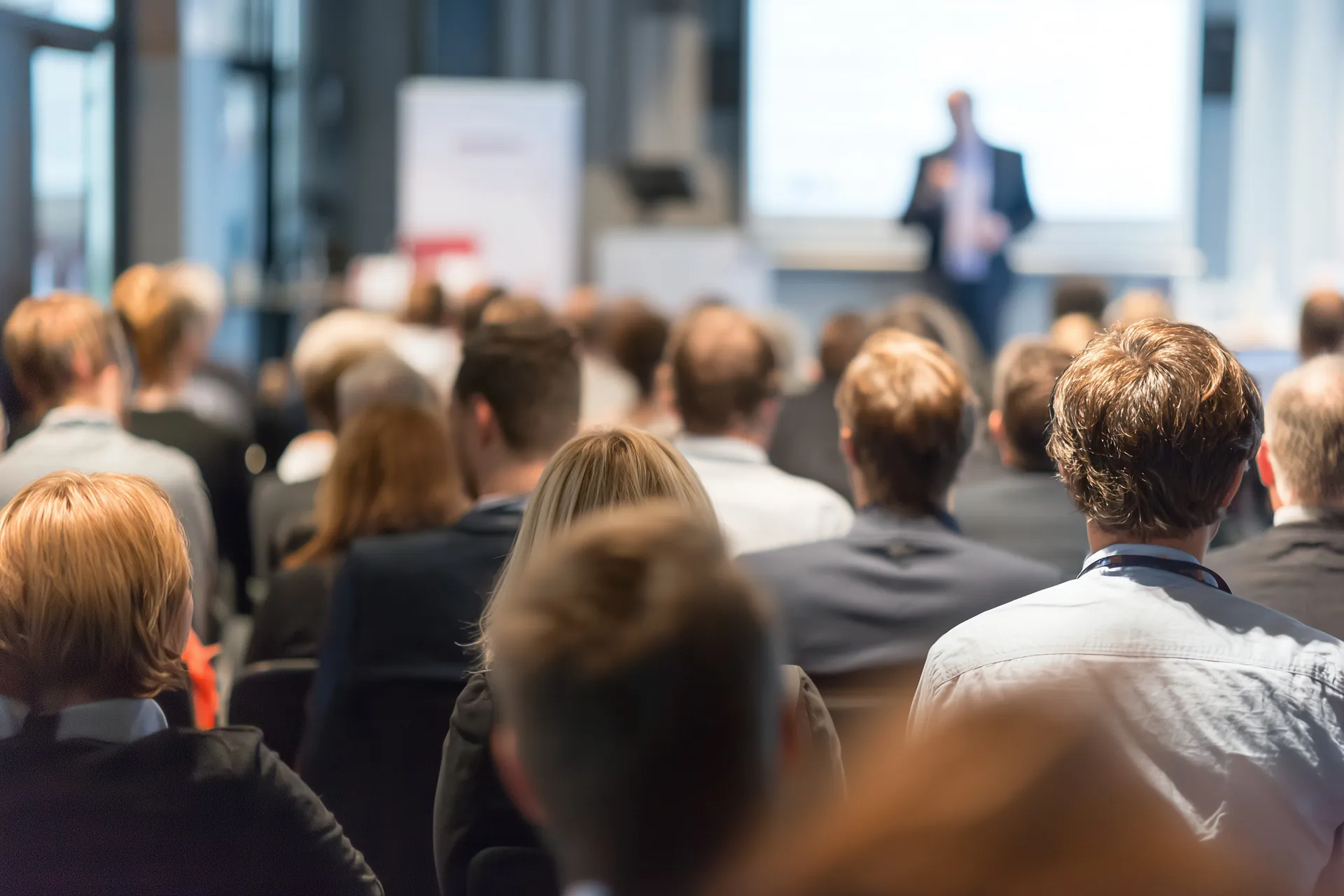 Audience of financial-institution professionals at an industry conference